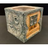 A Troika square vase, incised and in relief with geometrical motiffs, 14.5cm high, monogrammed,