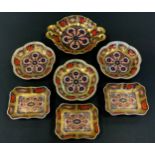 A Royal Crown Derby 1128 two handled pedestal dish; three rectangular trinket dishes; three shaped