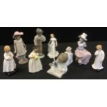 Four Nao figures; Royal Doulton figure, Friendship, HN3491; Darling, HN1985; Mandy, HN2476