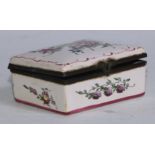 A French faience rectangular table snuff box, painted in polychrome with sprays of flowers, 9.5cm