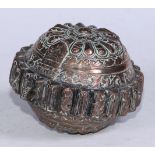 An Asian copper betel lime box, chased with lotus and scrolls, hinged cover, 11cm diam, possibly