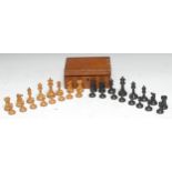 A boxwood and ebonised chess set, possibly Jaques, the pieces marked for King's side, the Kings 7.