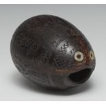 Treen - a 19th century Mexican coconut bugbear money box, profusely carved with figures, emblems and