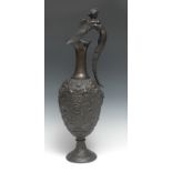 A large 19th century Renaissance Revival dark patinated bronze ewer, the ovoid lekythos body cast