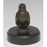 A French brown patinated desk bronze, cast as a falcon, circular black marble base, 8.5cm high,