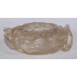 A Chinese rock crystal scholar's brush washer, carved with qilong, lingzhi and a bat, 15cm wide,