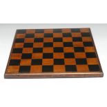 A 19th century painted mahogany chess board, 43cm square