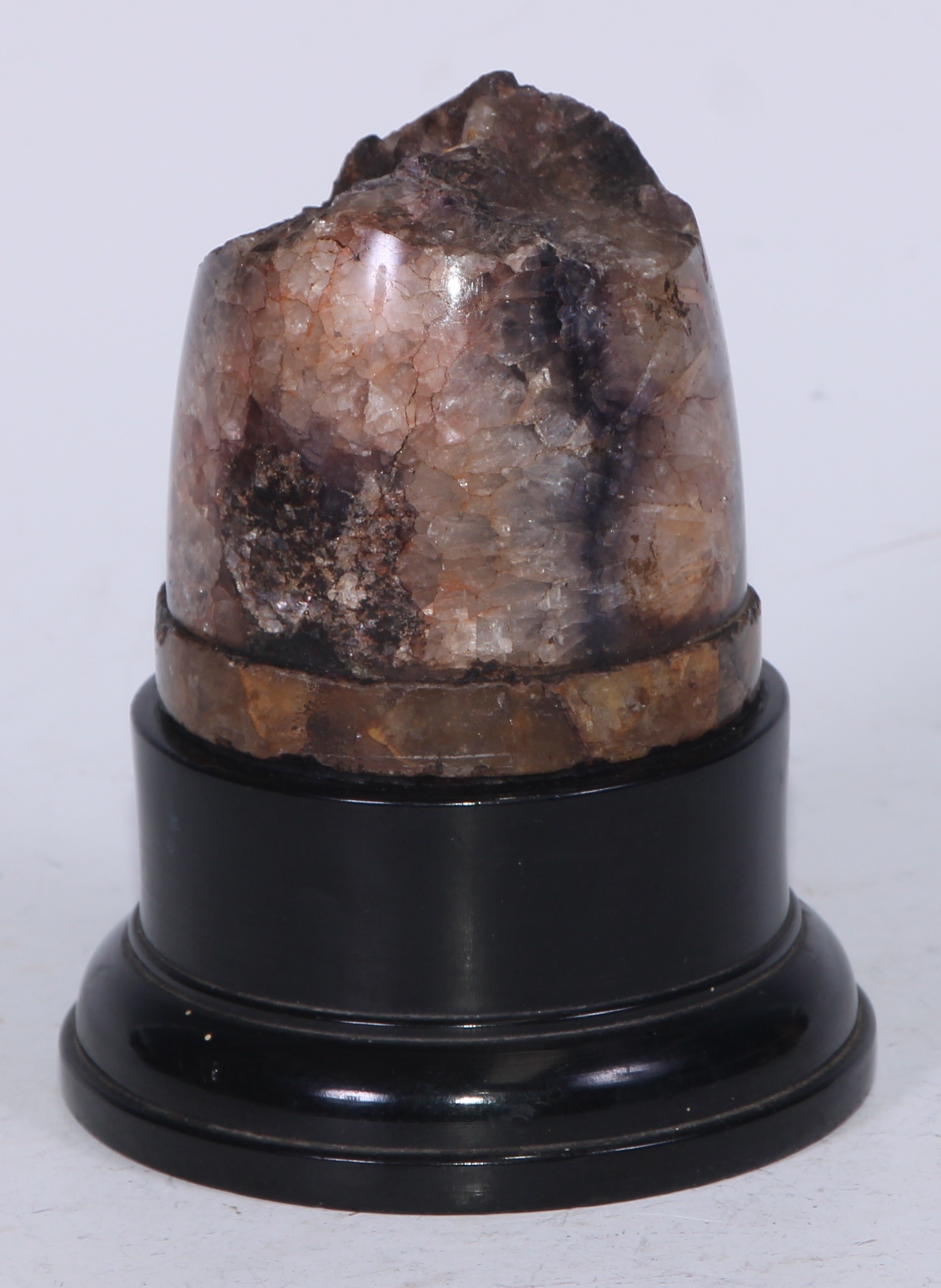 A Derbyshire Blue John section, mounted for display as a desk weight, ebonised plinth, 12cm high - Image 3 of 4