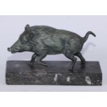 A verdigris patinated desk model, of a boar, rectangular marble base, 18cm long