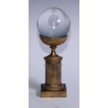 Mysticism and the Occult - a crystal ball, the gilt bronze Empire stand mid-19th century, 26cm high