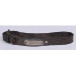 An early 20th century leather dog collar, the name plaque inscribed H Goodrum, Crowfield [