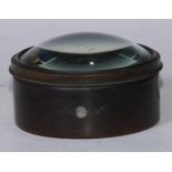 A 19th century patinated brass magnifying lens, 11cm diam