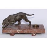 An Art Deco period speler mounted marble ink stand, surmounted by a spelter model of a retriever