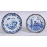 An 18th century Chinese circular dish, painted in underglaze blue with trellis, vases and flowers,