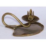 An Art Nouveau brass chamberstick, as a water lily, 16cm wide, c.1905