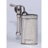 A World War I period silver cigarette lighter, 6cm long, Reg.No 66457, C C May & Sons, London 1918