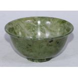 A Chinese spinach jade bowl, 10.5cm diam