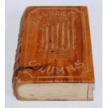 A Middle Eastern cedrus libani (cedar of Lebanon) novelty box, as a book, carved with a view of