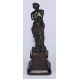 Grand Tour School (19th century), a brown patinated cabinet bronze, Venus de Milo, canted square