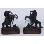After Guillaume Coustou the Elder (1677 - 1746), a pair of dark patinated cabinet bronzes, the Horse