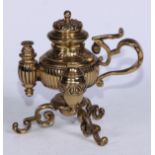 A 19th century lacquered brass gentleman's club cigar lighter, leafy scroll tripod base, 13cm