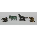 An Indian bronze murti, cast as a cow, verdigris patinated, 8cm long; others (4)