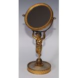 A French Palais Royale gilt bronze and mother of pearl table mirror, the circular tilting plate