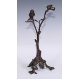 An early 20th century bronze novelty pocket watch stand, cast as an owl and a bird of prey perched