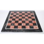 A large pietra dura marble chess board, 49.5cm x 49cm