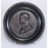 The Cult of Napoleon - a 19th century dark patinated bronze portrait roundel, depicting Napoleon