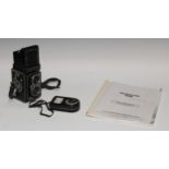 Photography - a Rolleiflex Automat 6x6 Model K4A camera, serial number 1293712, with photocopied