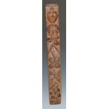 A Baroque oak pilaster, carved with a female mask and a pendant of fruiting branches, 61cm long,