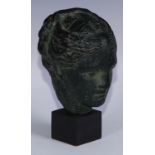 A museum type verdigris terracotta model, head of a goddess, after the Antique, 20cm high overall