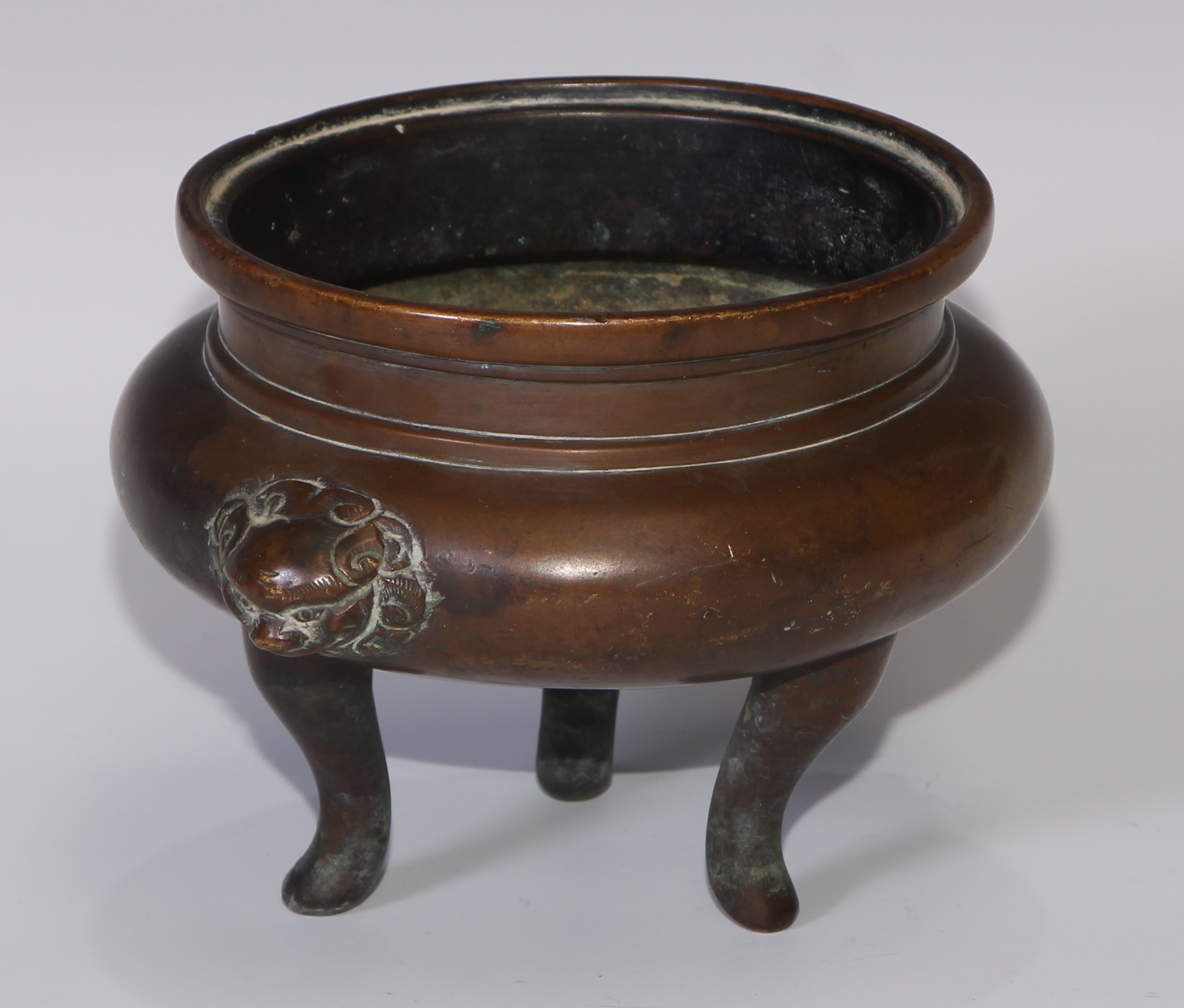 A Chinese bronze tripod censer, cast temple lion mask handles, tall serpentine legs, 16cm wide, 19th - Image 2 of 4