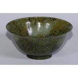 A Chinese spinach jade bowl, 10.5cm diam
