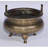 A Chinese bronze tripod censer, cast and chased with auspicious symbols, 12cm diam, six character
