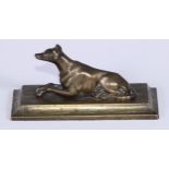 A 19th century bronze desk weight, cast as a recumbent greyhound dog, spreading rectangular base,