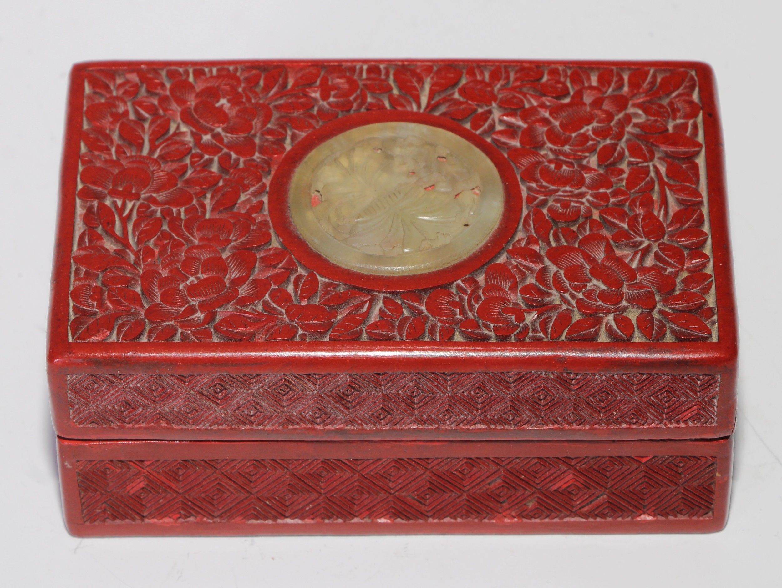 A Chinese cinnabar lacquer rectangular box, the cover centred by a carved and pierced roundel, - Image 2 of 4