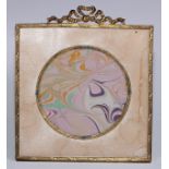 A French Empire design gilt metal mounted easel photograph frame, ribbon cresting, circular