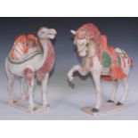 A pair of Chinese Tang Dynasty style painted terracotta models, of a camel and a horse, 48cm and