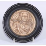 A mid-18th century Austrian Baroque alabaster bas relief portrait roundel, of Sigismund Graf von