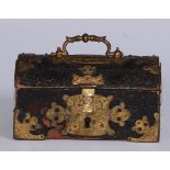 A 19th century gilt metal mounted miniature casket form money box, hinged domed cover with swing