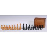 A boxwood and ebony Staunton pattern chess set, the Kings 8.5cm high