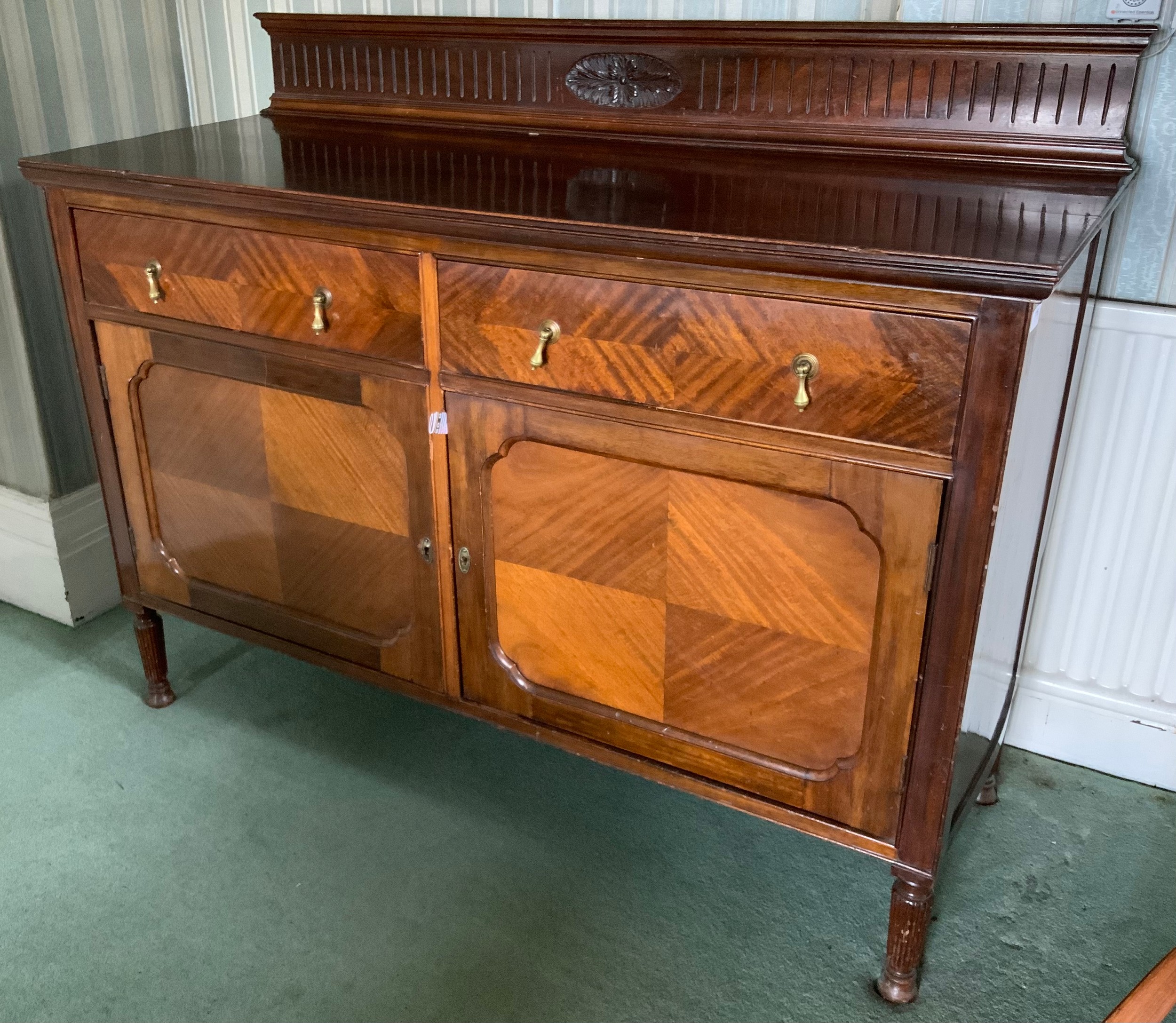 An early 20th century mahogany sideboard, fluted back gallery, two drawers above tow fielded - Image 4 of 4