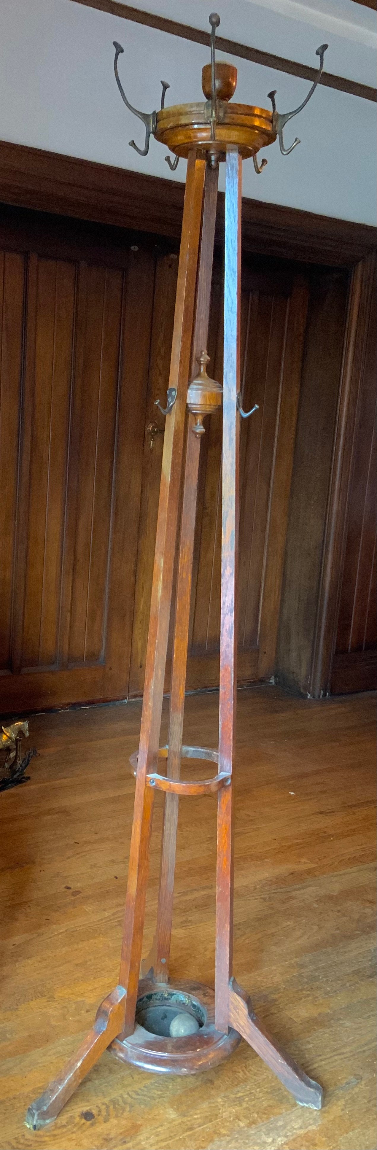 An early 20th century oak coat, hat and umbrella stand, turned finials, three splayed legs ** We - Image 2 of 4