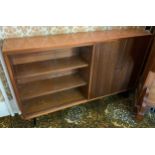 A mid 20th century G Plan type display cabinet, with glass sliding and cupboard doors, black splay