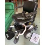A Travelux Quest Mid Wheel mobility chair ** We would please ask that all payments are made by