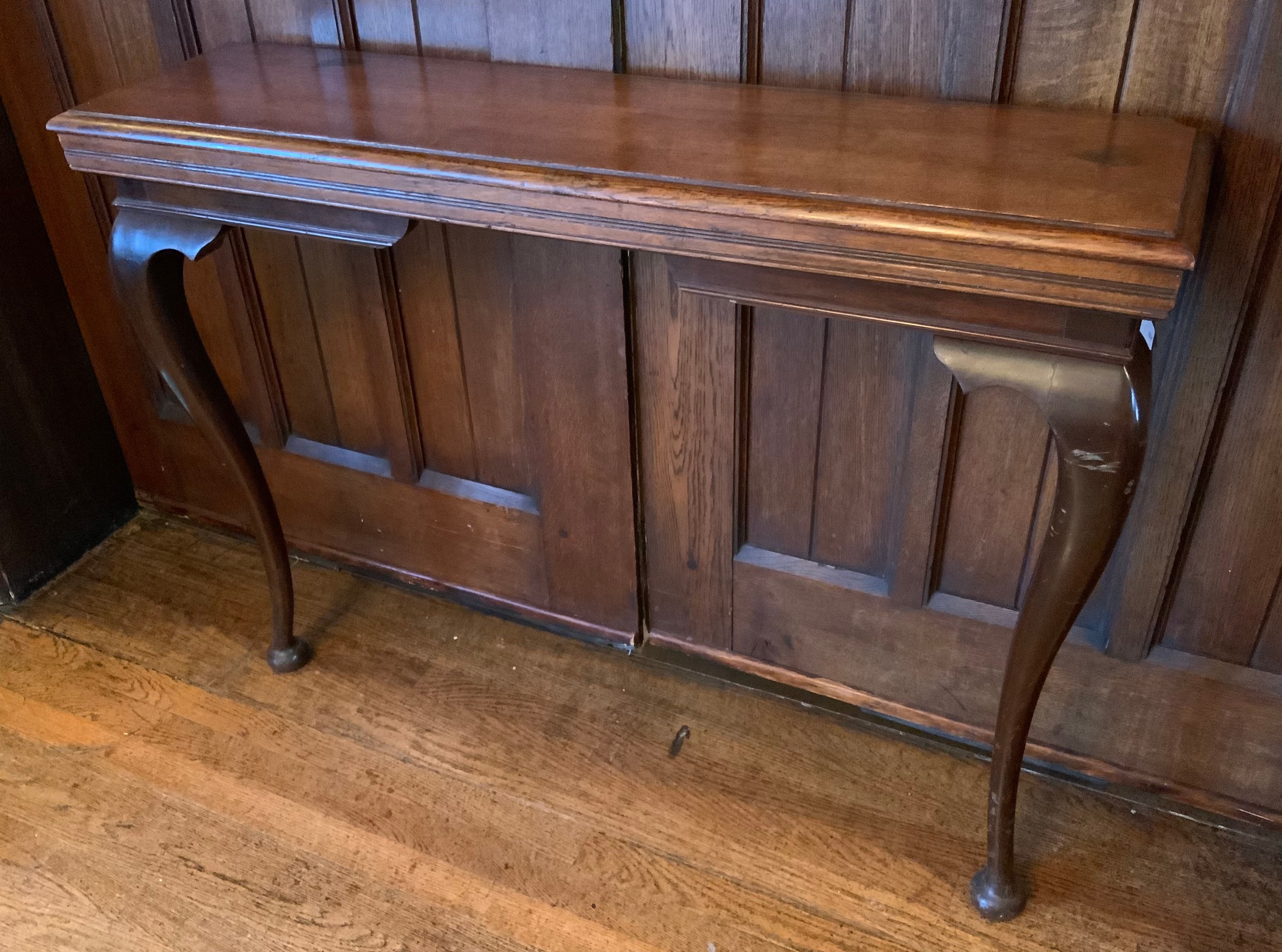 An early 20th century oak hall table, cabriole legs, pad feet, 75cm high, 24cm wide, c.1920 ** We