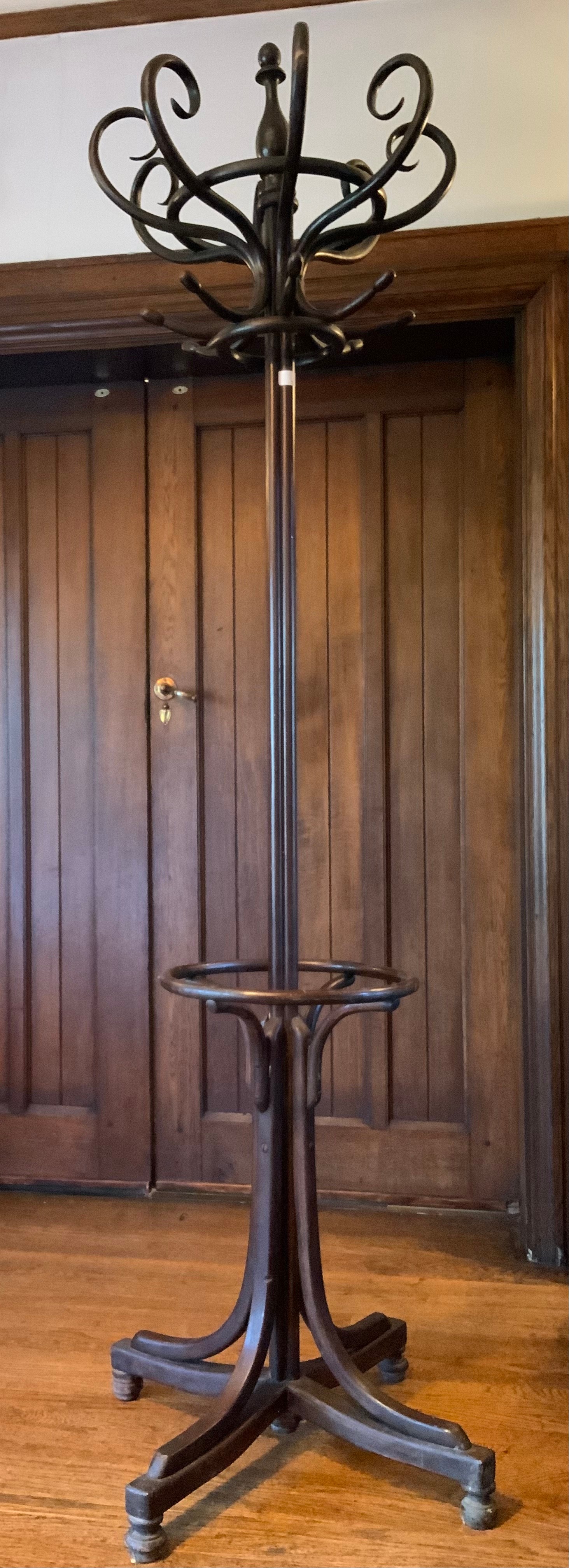 An early 20th century bentwood coat stand, cluster column, quatrefoil base, 210cm high, c.1910