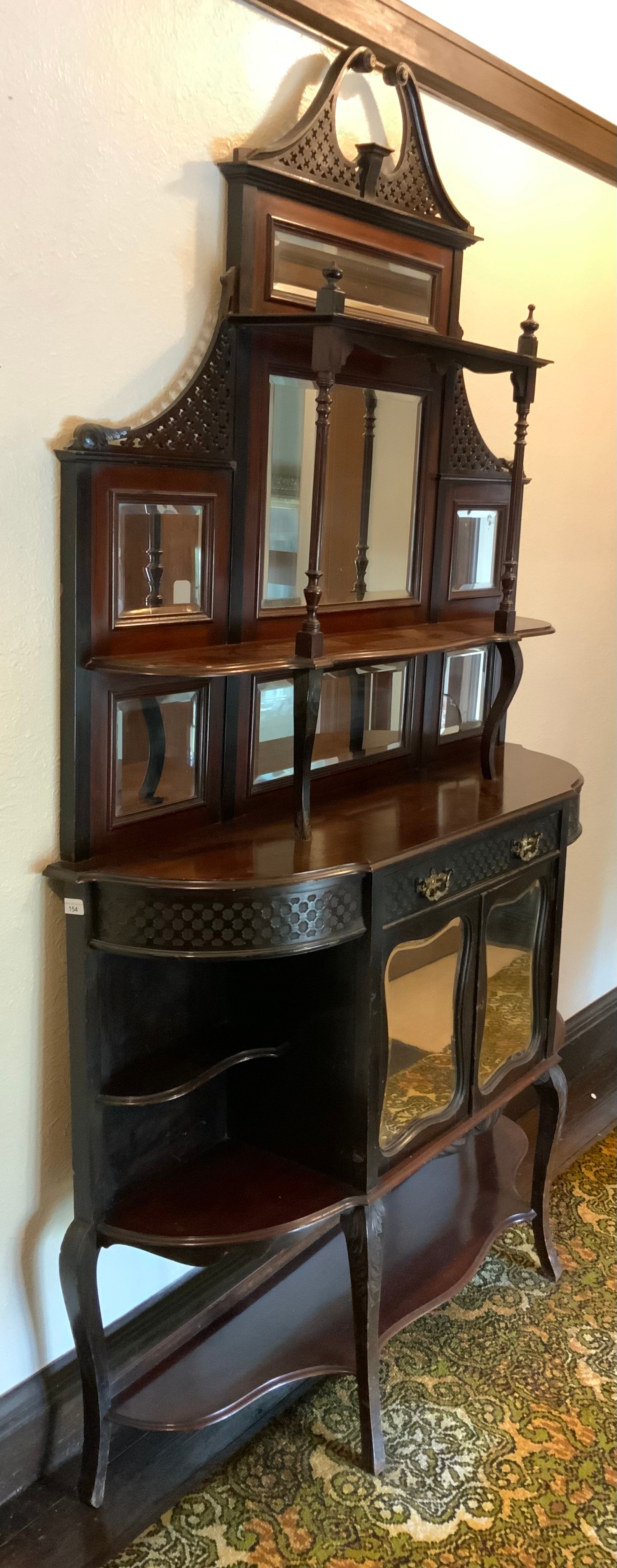 A Victorian ebonised chiffoniere, with blind fret swan neck pediment above two shelves and seven - Image 2 of 4